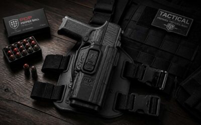 Carry a pepper ball gun with holster for reliable personal protection.